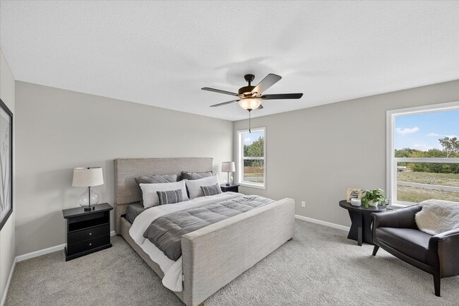 Building Photo - Westview townhome plan in Corcoran’s Hope Meadows community—a brand-new townhome development near...