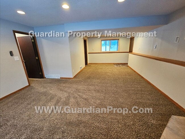 Building Photo - Updated Plymouth Single Family Home, 2 Car Garage, Large fenced Yard, Gas Fireplace