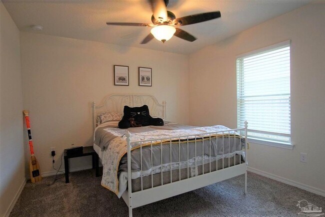 Building Photo - Popular Floor Plan, Almost New Home in Woo...