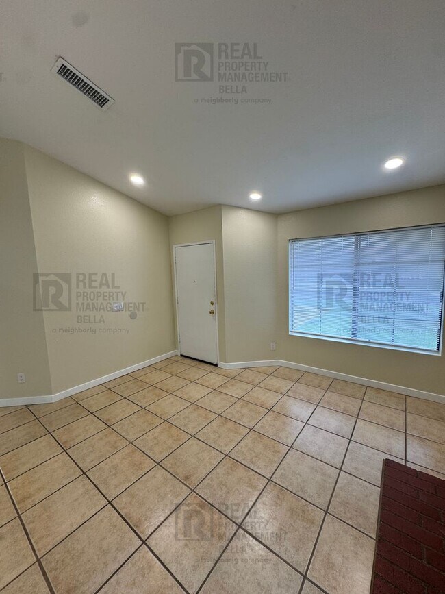 Building Photo - Corner-Lot Charmer with Open Layout and Sp...