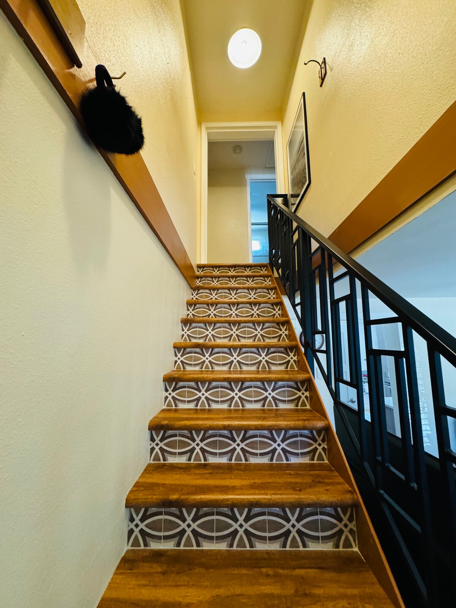 Stairs to upper level - 330 W 4th St