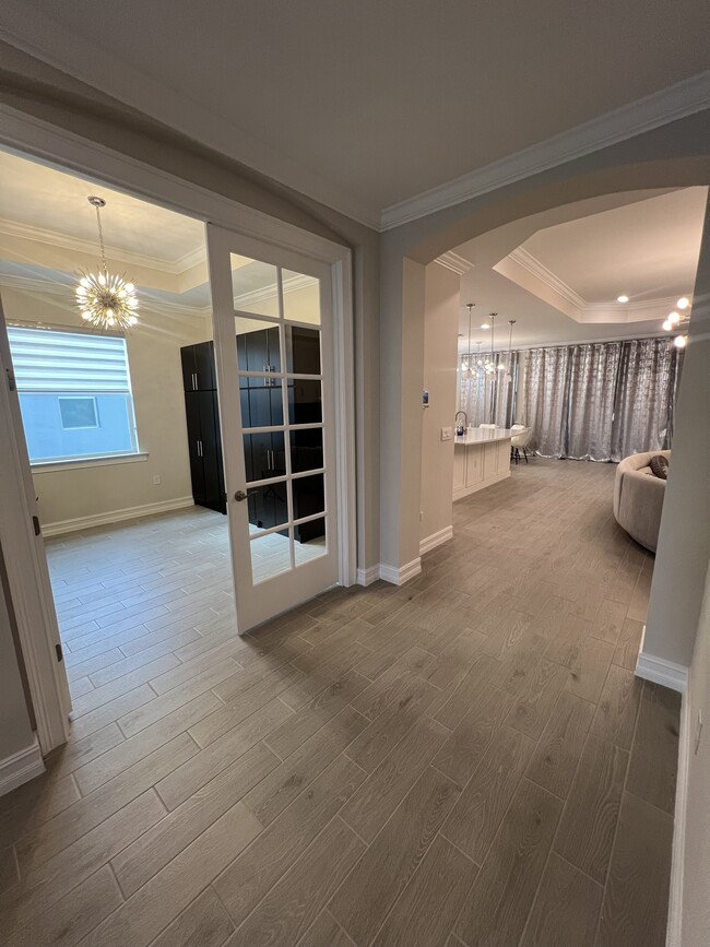 Hallway with Closed blinds in living room - 540 Polihale Way