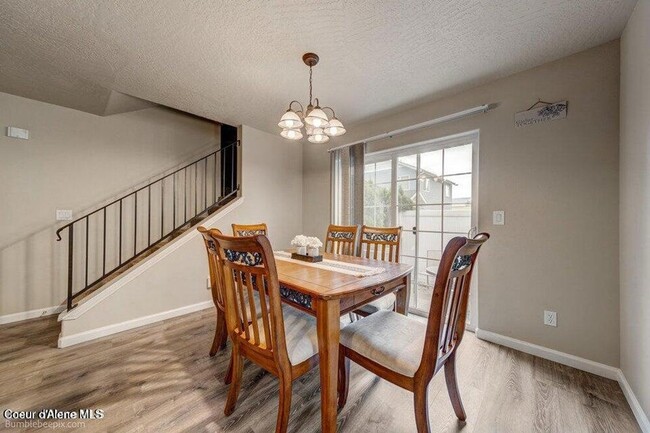 Building Photo - Beautiful Updated 3 Bedroom Condo with A/C, Garage & Fireplace in Forsythia Place!