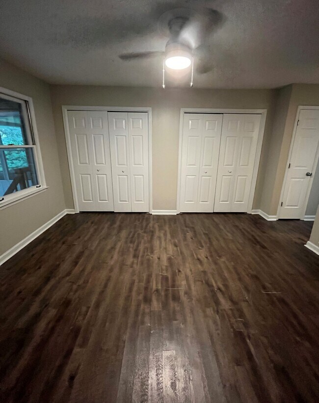 Main floor master bedroom - double closets and storage closet - 440 Williamsburg Way