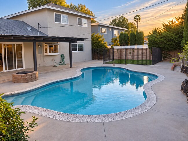 Building Photo - Available Now- 4-Bedroom Pool Home with Downstairs Bed & Bath – Centrally Located in Canyon
