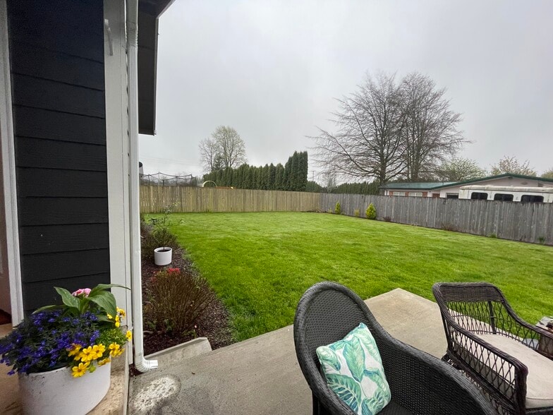 Large fully fenced backyard. - 627 N 3rd St