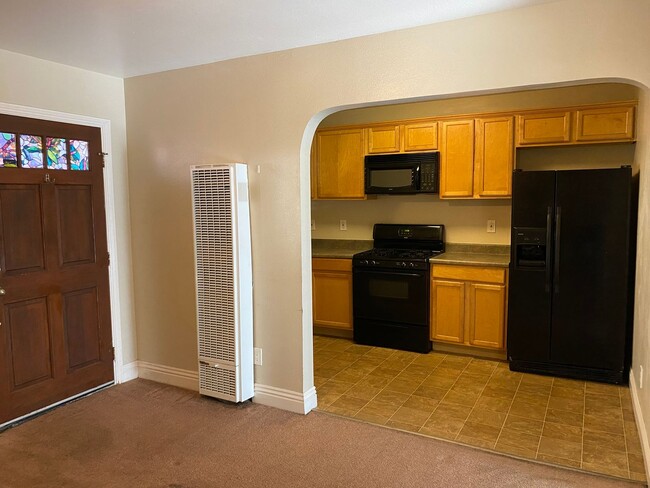 Building Photo - AFFORDABLE 1st Floor Condo & patio yard!