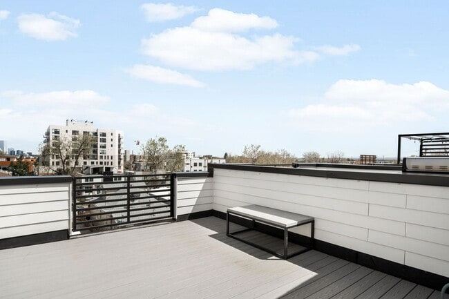 Building Photo - Modern 2-Bedroom Rowhome with Rooftop Moun...