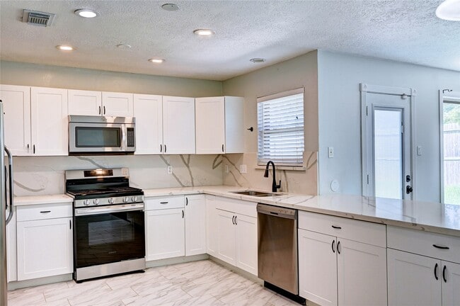 Building Photo - 5103 Temple Bell Dr