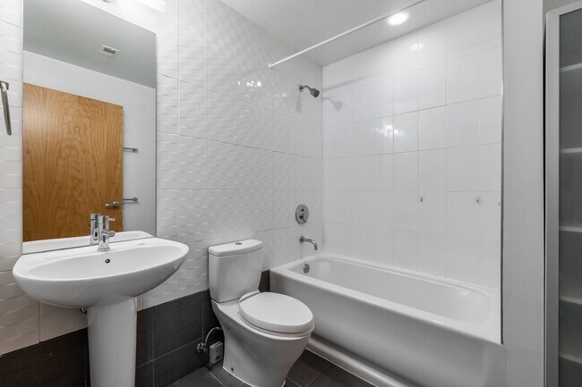 Building Photo - Enjoy all that Logan Circle and Mount Vernon Square have to offer in this modern and bright 2 bed...