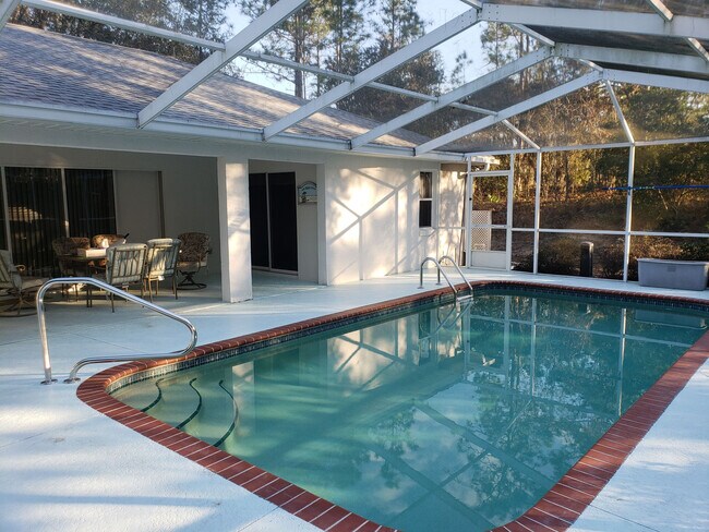 Building Photo - Lovely Pine Ridge Pool Home