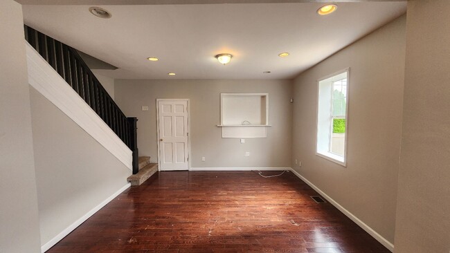 Building Photo - Corner 1st and 2nd flr. unit with central ...