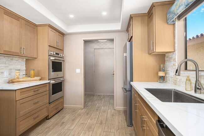 Building Photo - 37710-37710 Los Cocos Dr E