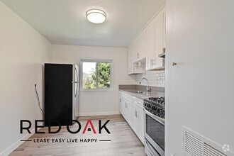 Building Photo - Fabulous Top Floor One Bedroom with Exquis...