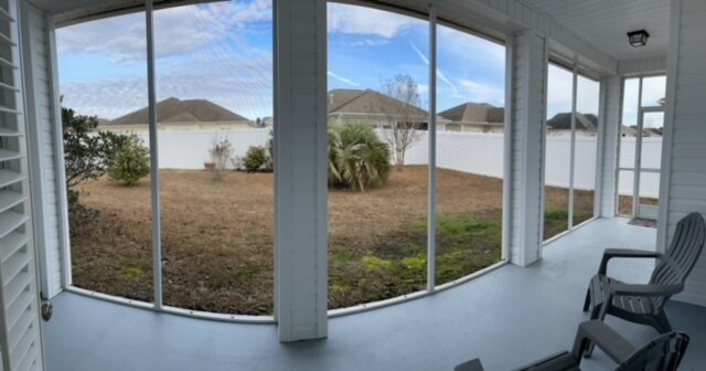 fully fenced backyard (taken in winter, grass is green in summer) - 824 Wintercreeper Dr