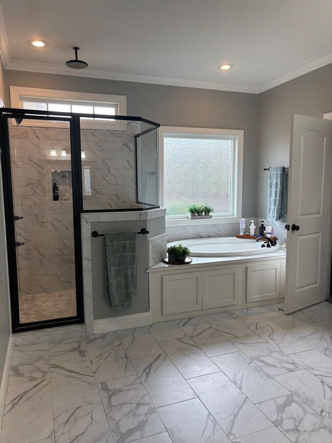 Building Photo - Spacious 4BR/3BA Creekside West Home with Screened Porch, Fenced Yard & 3-Car Garage