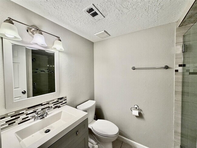 Building Photo - 12235 W Village Dr