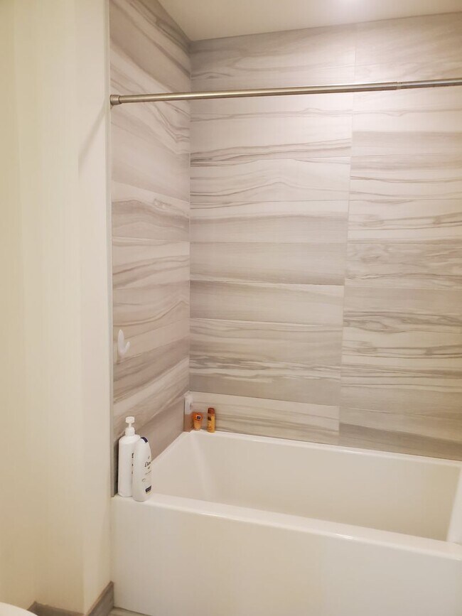 Building Photo - High end one bedroom plus at the luxurious...