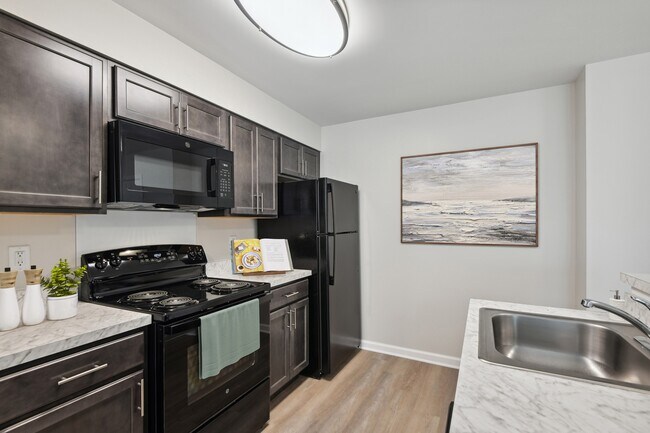 Building Photo - The Village at Slippery Hill Senior Apartments- 62+