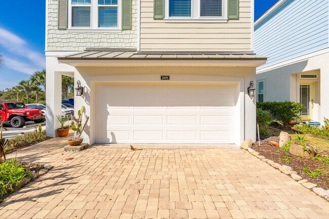 Building Photo - Welcome to Coastal Living at its Finest!