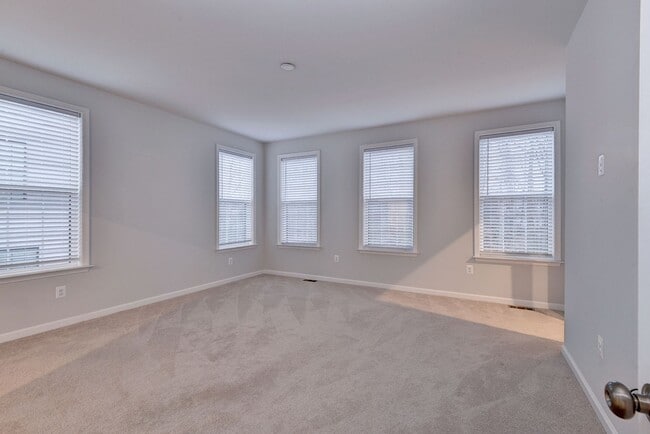 Building Photo - Three Story Brick End Unit with Rooftop Terrace