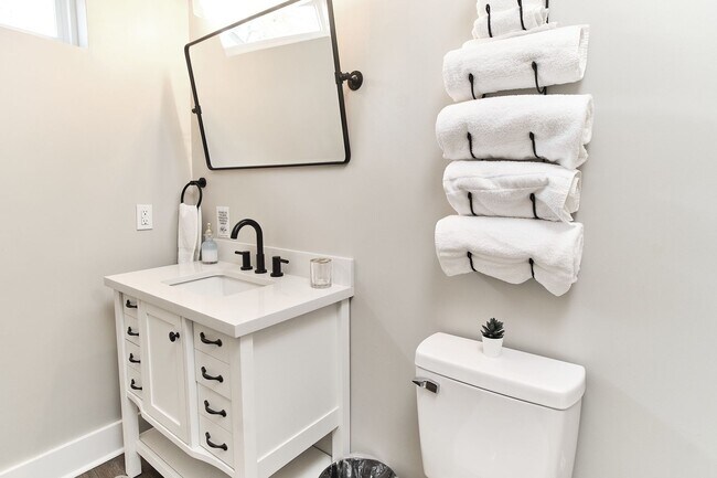 Building Photo - Fully Furnished 2BD Duplex in the Heart of...