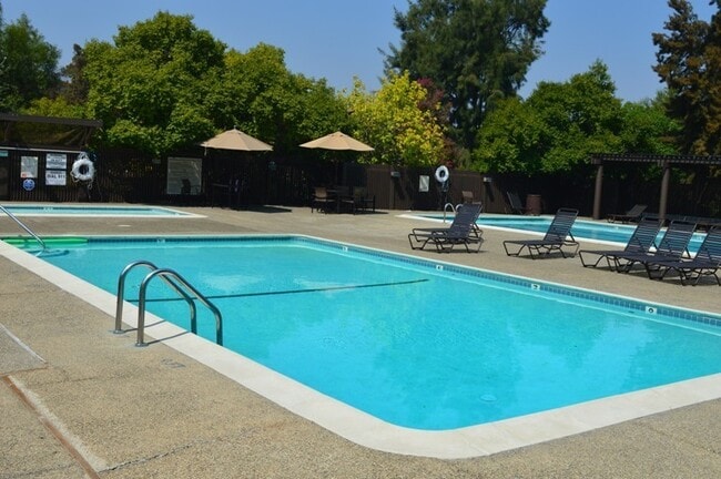 Building Photo - Light-Filled, Thoughtfully Updated Condo with Private Patio & Resort Amenities