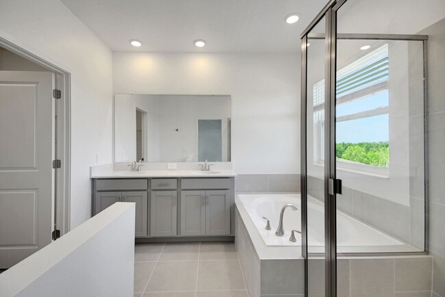 Building Photo - Stunning 4/3 in Gated Dora Parc! Water Views!
