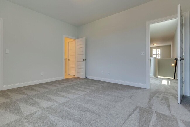 Building Photo - Welcome to your dream home in desirable Tollgate Village!