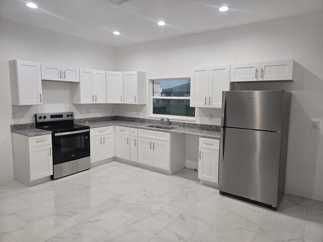Building Photo - BRAND NEW THREE BEDROOM, 2 BATH, 1 CAR GAR...