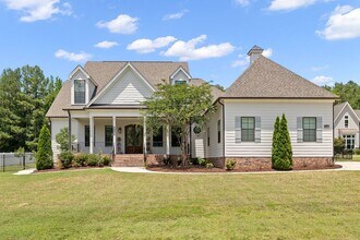 Building Photo - **Luxury 4/4 with Fenced in Yard**