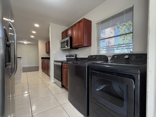 Building Photo - "Charming 3-Bedroom Home with Gleaming Hardwood Floors!"
