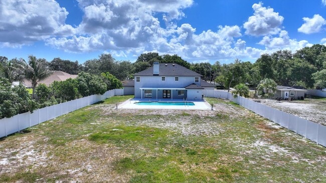 Building Photo - Rare Luxury Lease Opportunity | Spectacular 5-Bedroom Pool Estate on Nearly ¾ Acre Near Gulf Beaches