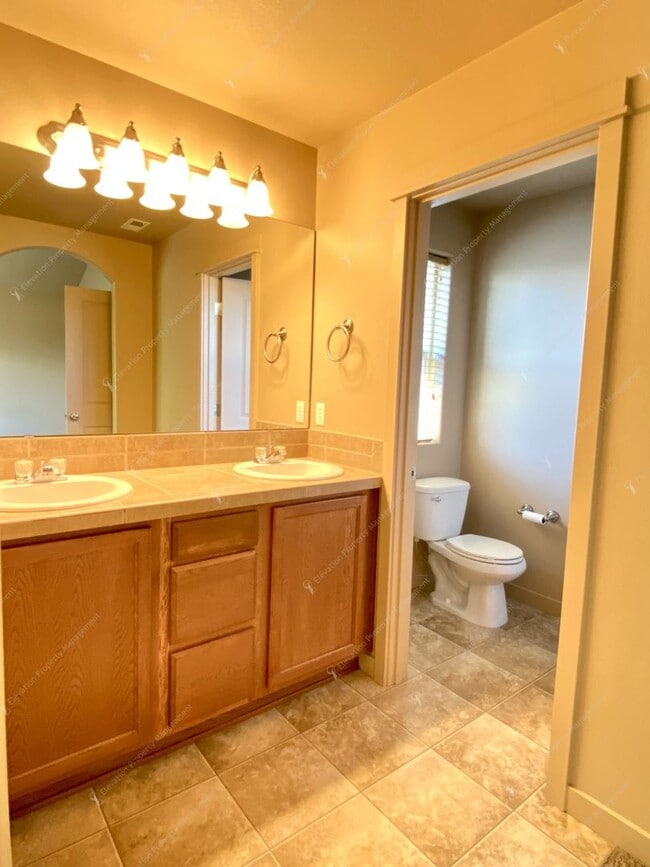 Building Photo - 3  BR home with new flooring in a great NE...