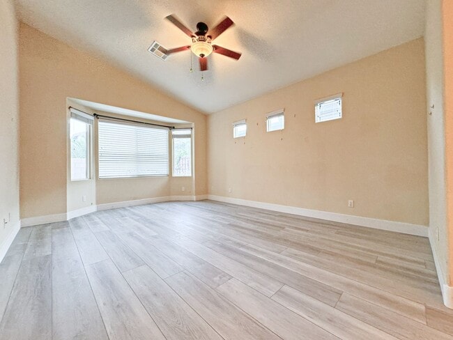 Building Photo - Vaulted Ceiling single-story home in a gat...