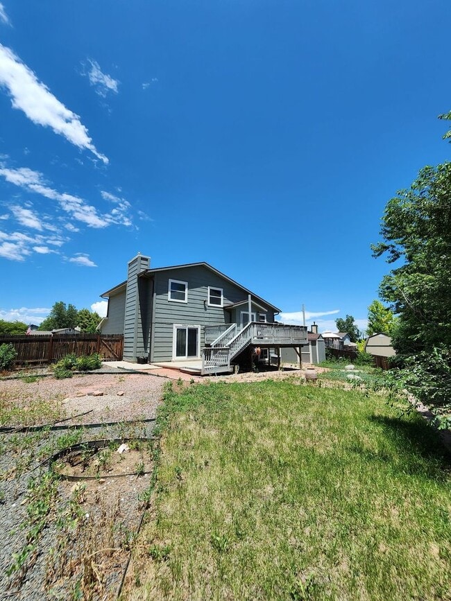 Building Photo - Spacious 4-Bedroom Home with RV Parking in...