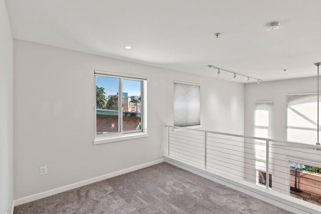 Building Photo - Well maintained two-story condo - Bright End Unit - Lease Terms Options Outlined in Description