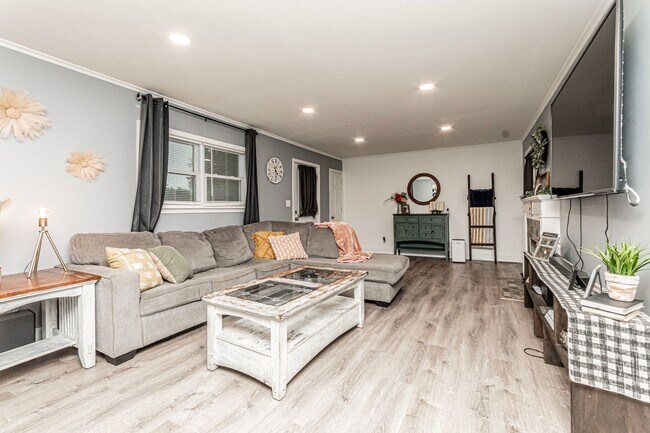 Building Photo - Back porch with a large yard!