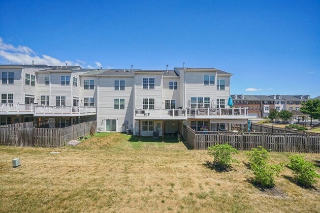 Building Photo - This beautiful townhome spans three finished levels and over 2800 square feet.