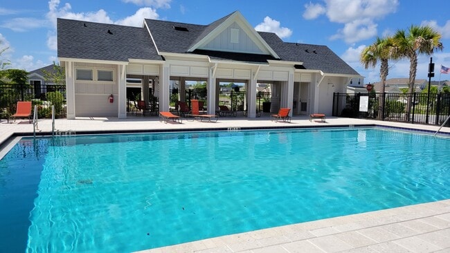 Building Photo - Annual UNfurnished NEW 4/ 2 1/2 home off S...