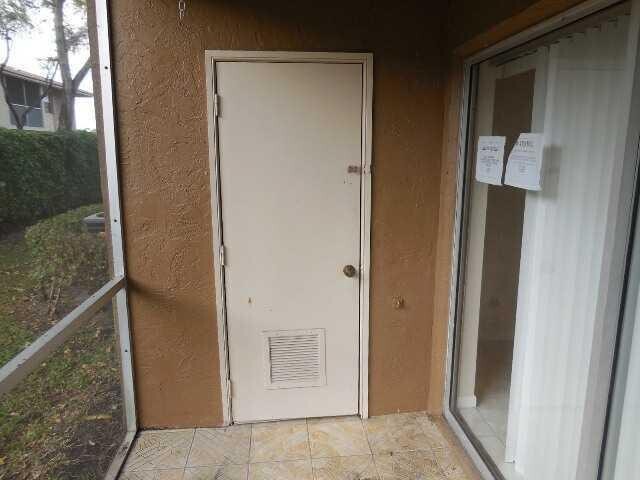 Building Photo - 8393 Royal Palm Blvd