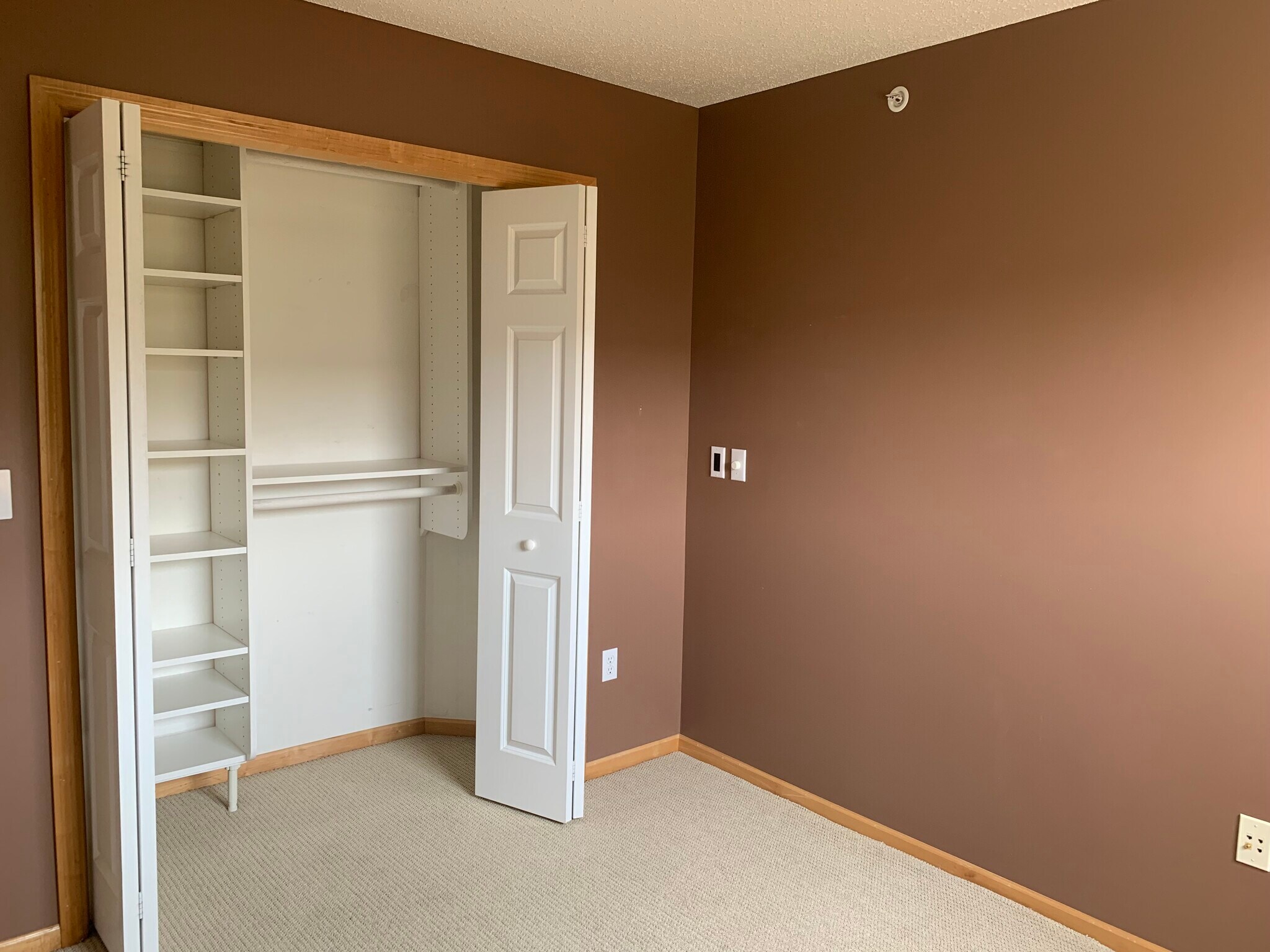 Second bedroom, upstairs featuring California Closets. - 1530 Zarthan Avenue South