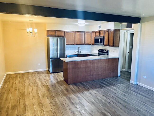 Building Photo - 3663 S Sheridan Blvd