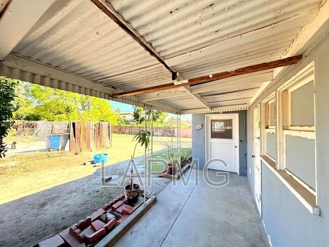 Building Photo - 6200 N Muscatel Ave