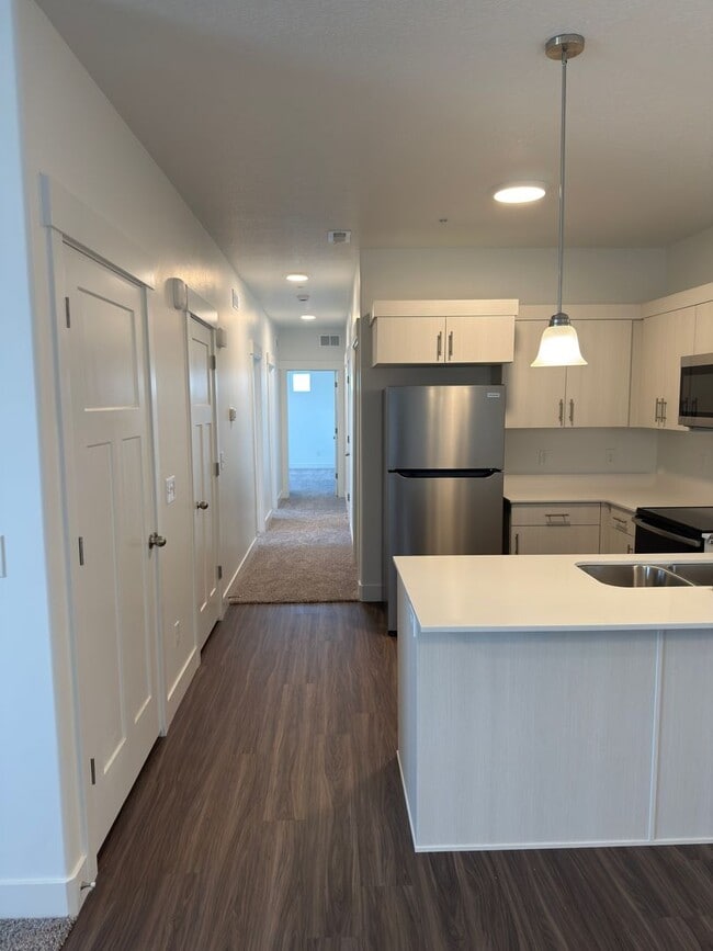 Building Photo - Brand New 3 Bed Condo with Resort-Style Amenities & Included Internet!