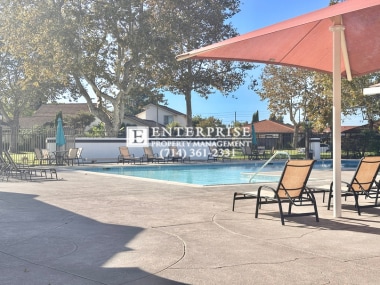 Building Photo - Luxury Living Made Easy: Your Tustin 2-Bedroom Condo Awaits with a Pool and Tennis Courts