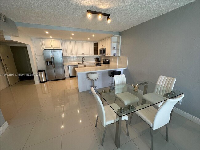 Building Photo - 19380 Collins Ave