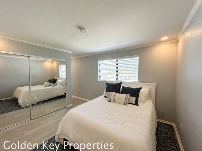 Building Photo - Welcome to this stunning ***unfurnished*** tri-level condo in the desirable Casitas de la Costa c...