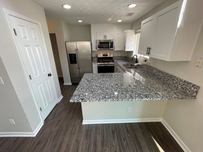 Building Photo - Updated 3BR Home - Woodstock