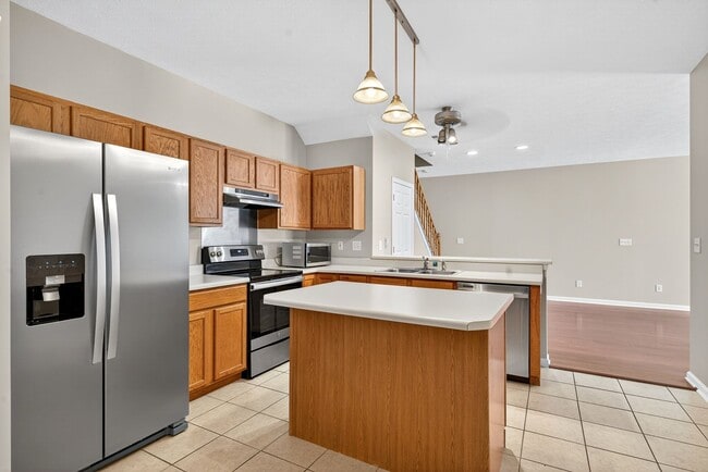 Building Photo - Charming Fishers Condo – Move-In Ready